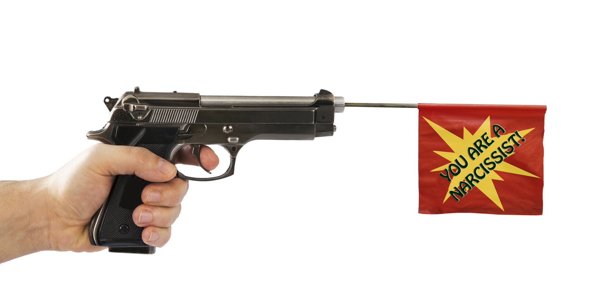 Male hand holding a fake pistol with red flag isolated on white background.